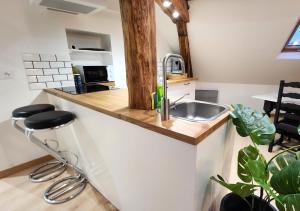 Appartements Le 6eme ciel de Gutenberg - climatise : photos des chambres