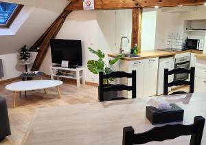 Appartements Le 6eme ciel de Gutenberg - climatise : photos des chambres