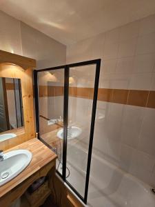 Appartements Les 3 Vallees - Hameau des eaux d'Orelle - Appartement 003 : photos des chambres