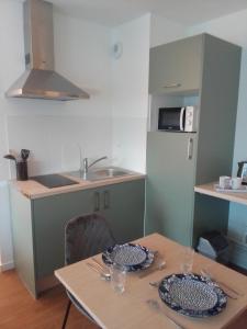 Zenao Appart'hotels Boulogne-sur-Mer - La Rose des Vents : photos des chambres