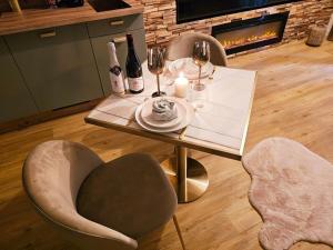 Appartements La Parenthese - Votre Cocon au Centre d-Oyonnax : photos des chambres