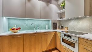 Rezydencja Niechorze 129 z Basenem i SPA Gratis oraz ogródkiem - 5D Apartments