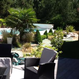 Sejours chez l'habitant Pascal et Domi CHAMBRES l-oasis des pins : photos des chambres