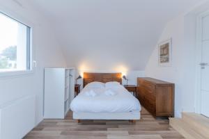 Maisons de vacances TY KREIZH - Maison neuve avec piscine proche mer : photos des chambres
