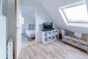 Maisons de vacances TY KREIZH - Maison neuve avec piscine proche mer : photos des chambres