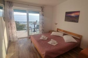 One-Bedroom Apartment with Balcony and Sea View room in Apartments with a parking space Zivogosce - Porat Makarska - 16289