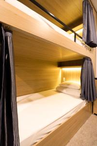 Giường Trong Phòng Tập Thể Nữ 12 Giường (Bed in 12 Bed Female Dormitory Room)