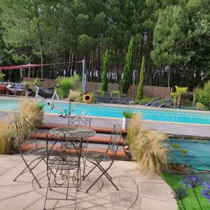 Sejours chez l'habitant Pascal et Domi CHAMBRES l-oasis des pins : photos des chambres