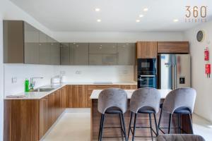 A lovely 2BR APT with comfy living space & balcony by 360 Estates