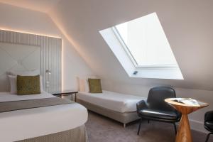Hotels Le Parisis - Paris Tour Eiffel : photos des chambres