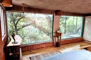 The Red Cabin at the bottom of Tepoztláns Forest
