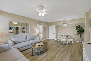 Rare beachfront condo with pool, social room and grill