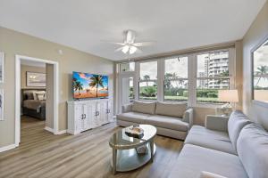 Rare beachfront condo with pool, social room and grill