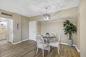 Rare beachfront condo with pool, social room and grill