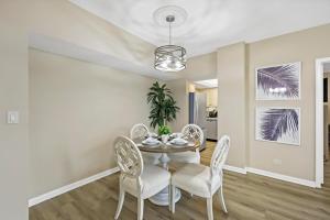 Rare beachfront condo with pool, social room and grill