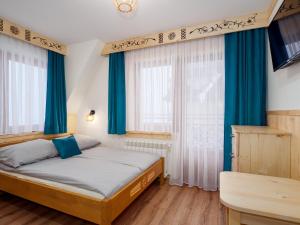 Pokoje Krystyna I Andrzej Łukaszczyk z WIDOKIEM NA GÓRY I STACJE NARCIARSKĄ