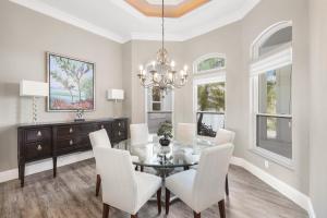 Opulent golf front home with SW-facing lanai and pool