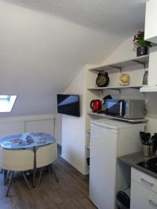 Appartements Studio tout equipe : photos des chambres