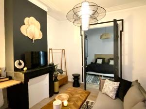 LArt appart - Lit King Size - Home cinéma