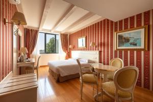 Deluxe Junior Suite room in Noventa Hotel