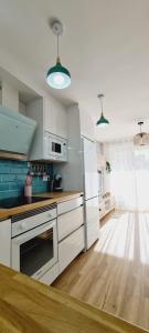 APARTAMENTO NUEVO CÉNTRICO en PRIMERA Línea de playa con vistas al Mar, Piscina, aire acondicionado y wifi