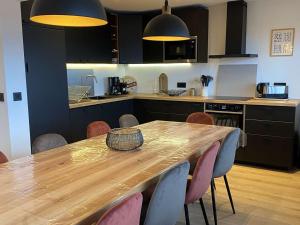 Appartement spacieux 5 pièces pour 10 pers à LAlpe dHuez, proche pistes et commerces - FR-1-405-347