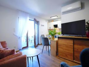 Spacious holiday homes with terraces, Mielenko