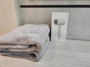 UG Homestay BP - Netflix & 4 Air-Con Rooms