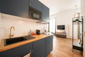 Appartements Le Laurencin Sens - Le Seventies : photos des chambres