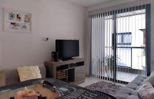 Departamento L246, Céntrico con Estacionamiento