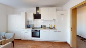 CROWN LIVING Design Apartment - gratis Parkplatz - WLan - Küche - Self Check-in