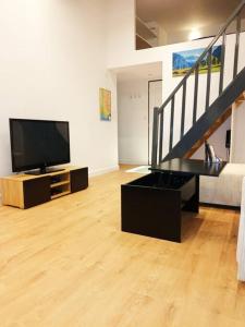 Appartements Grand studio avec mezzanine : photos des chambres