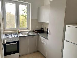Modern and spacious 3-bedroom apartment with balcony & garden near beach