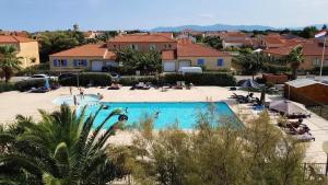 Villas Agreable maison avec acces terrasse et piscine collective 4PIN9 : photos des chambres