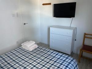 Apartamento en complejo residencial con piscina y garaje frente al mar