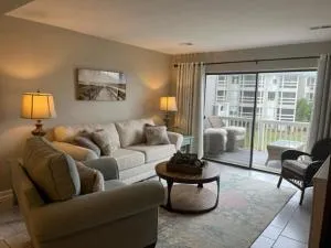 NEW LISTING! Centrally Located with Pool and Beach Views - Oceanmarsh Subdivision