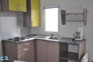 Mobile-home les pieds dans leau