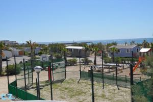 Campings Mobile-home les pieds dans l'eau : photos des chambres