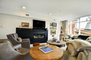 Contemporary Custom Condo Paired with the Best Location in the Center of Main Street. Walk to Ski.