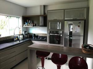 Casa com piscina em itapema