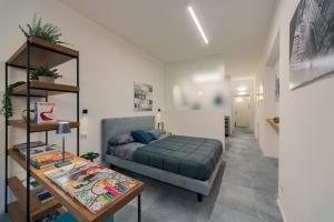 GuestHost - Stylish loft near Piazza del Campo