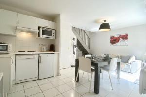 Maisons de vacances Maison 4 personnes avec jardin et parking : photos des chambres