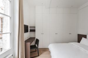 Appartements Adresse Prestigieuse: Appartement Luxueux Marais : photos des chambres
