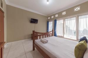 Urbanview Resort Anty Cisarua Tugu Puncak by RedDoorz