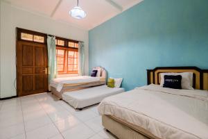 Urbanview Hotel Near Jatim Park 1 by RedDoorz