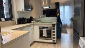 Appartements By nuit-parisienne Villemomble joli appartement tout confort : photos des chambres