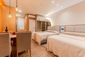 Luxuoso Loft em Condomínio com Piscina a 150m do Mar