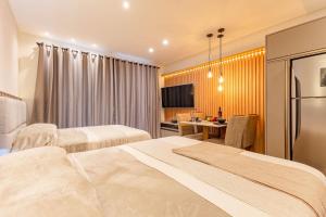 Luxuoso Loft em Condomínio com Piscina a 150m do Mar