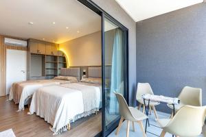 Luxuoso Loft em Condomínio com Piscina a 150m do Mar