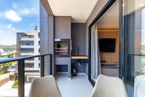 Luxuoso Loft em Condomínio com Piscina a 150m do Mar